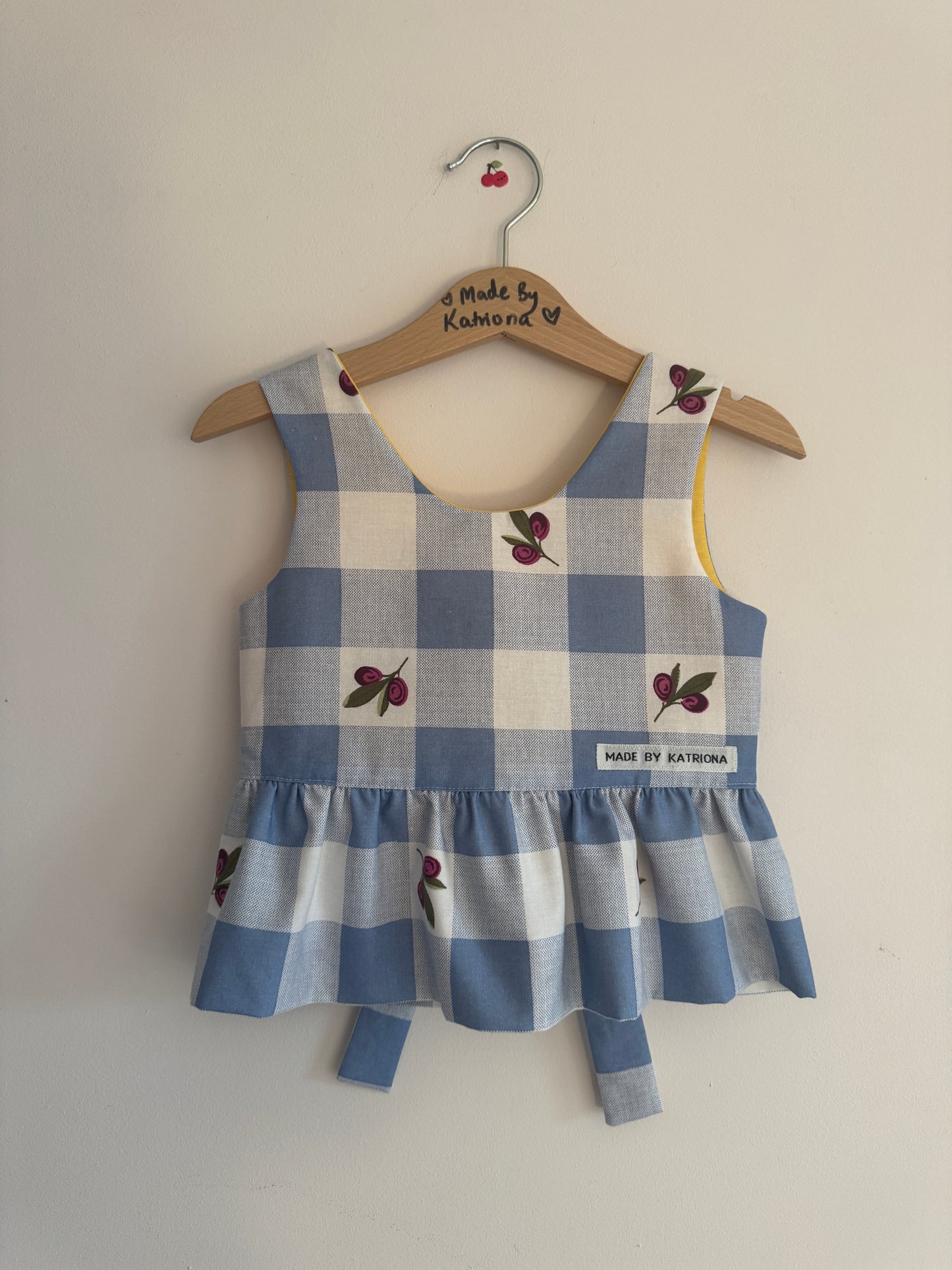 Blue gingham/yellow floral reversible bow tie top 3-4 years