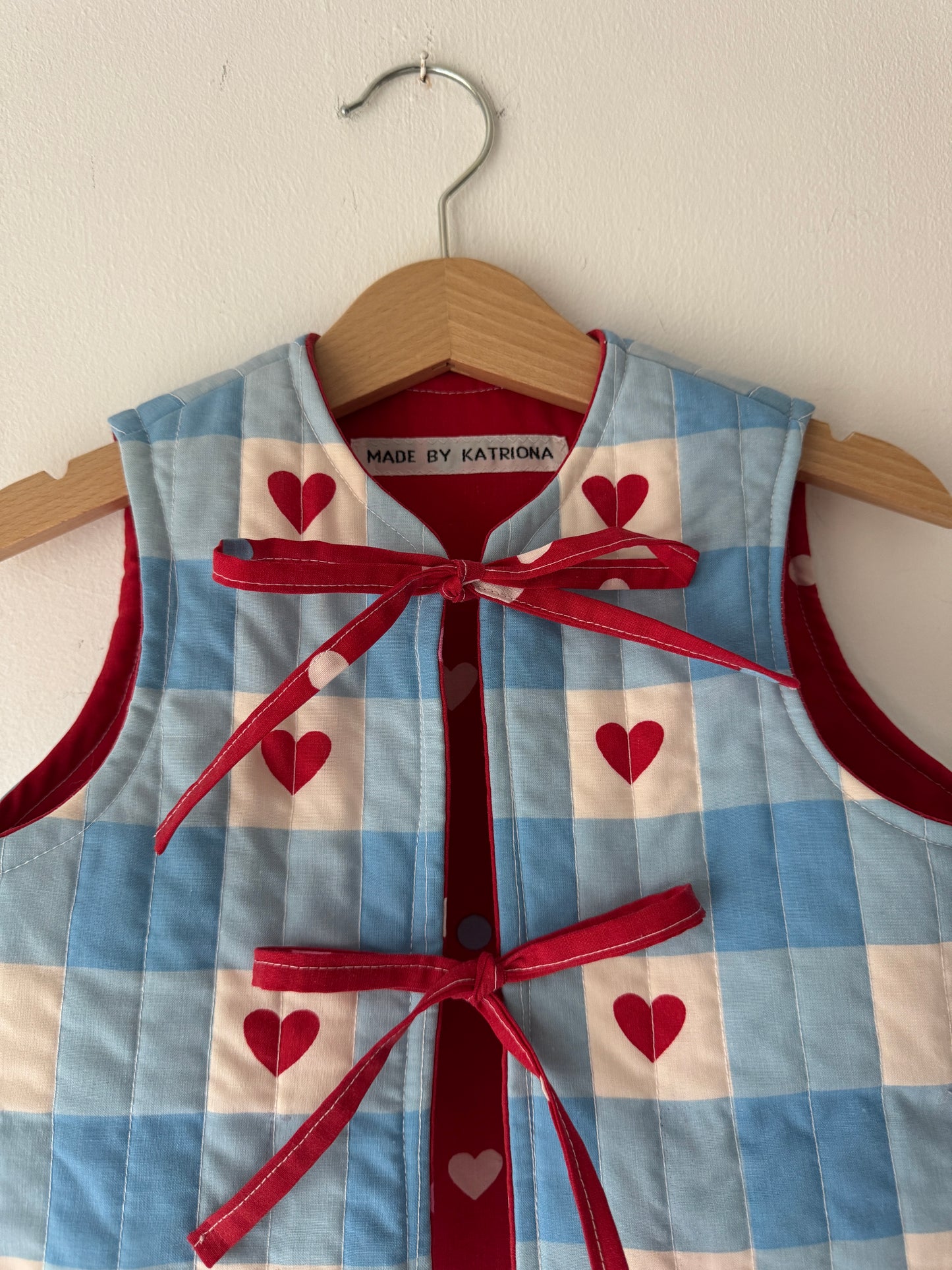 Blue gingham/hearts reversible quilted gilet 1-2 years