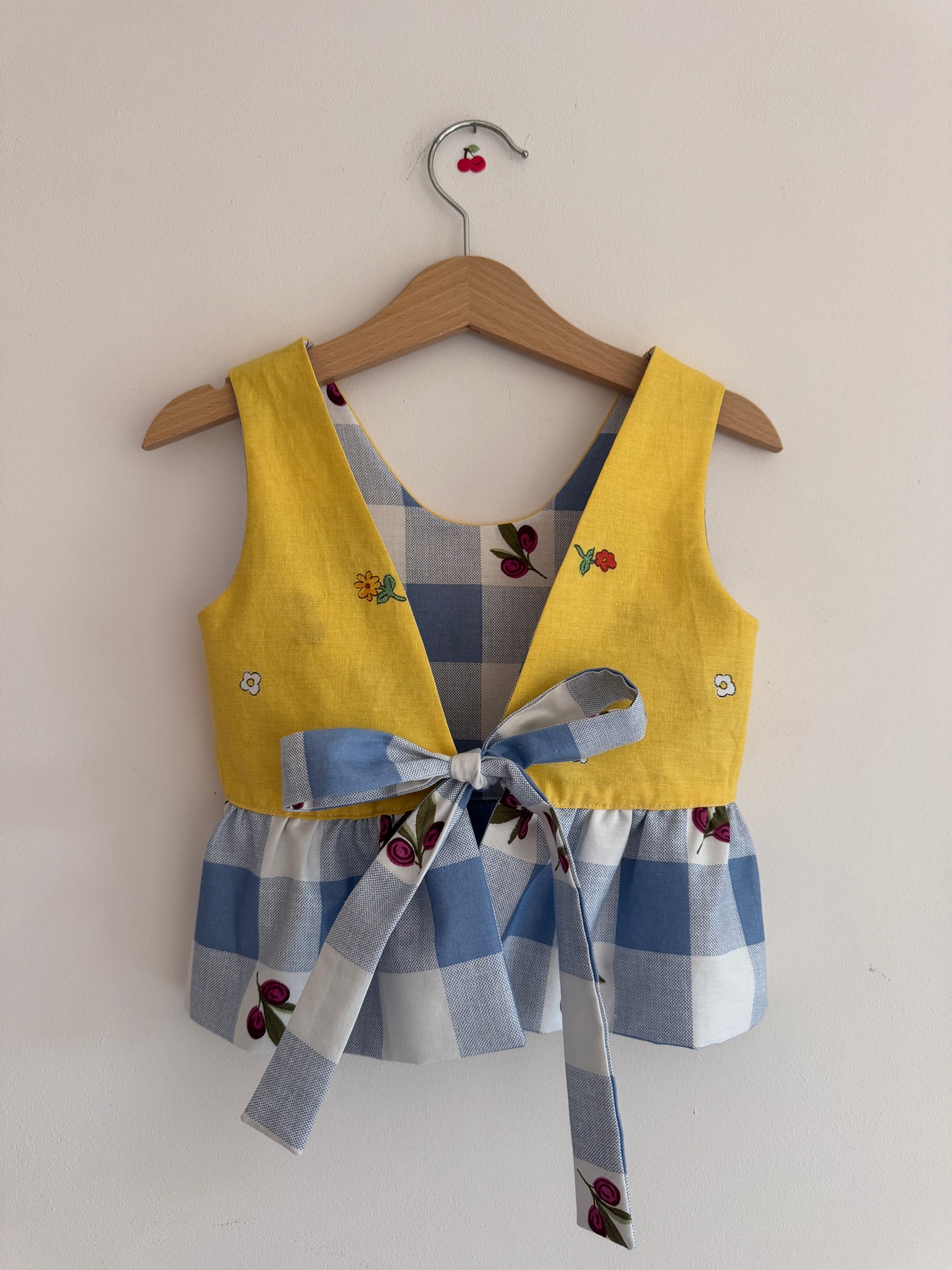 Blue gingham/yellow floral reversible bow tie top 3-4 years