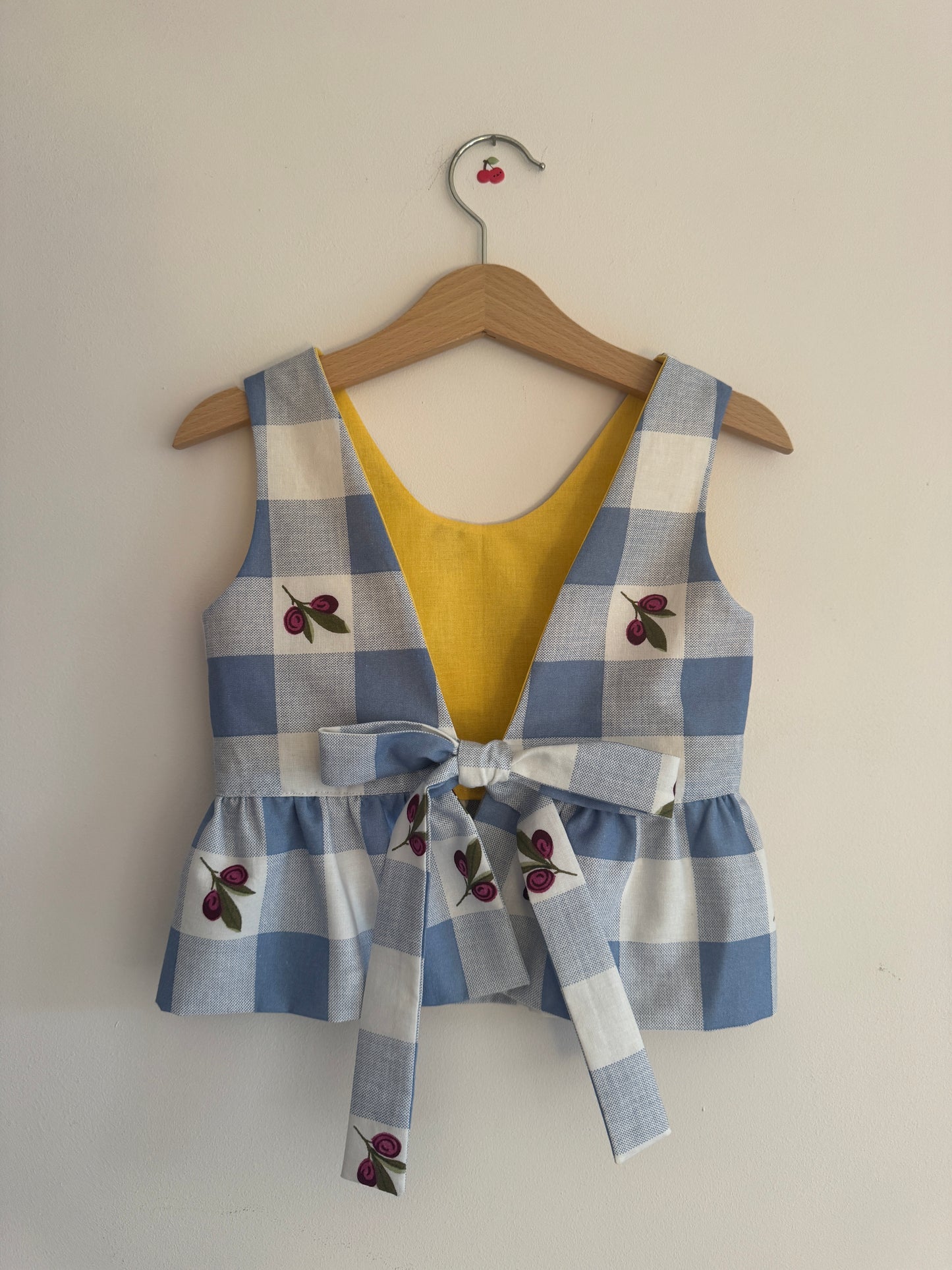 Blue gingham/yellow floral reversible bow tie top 3-4 years