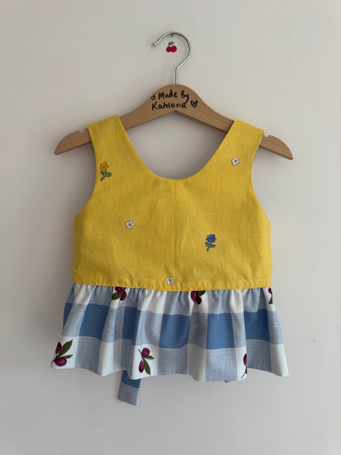 Blue gingham/yellow floral reversible bow tie top 3-4 years