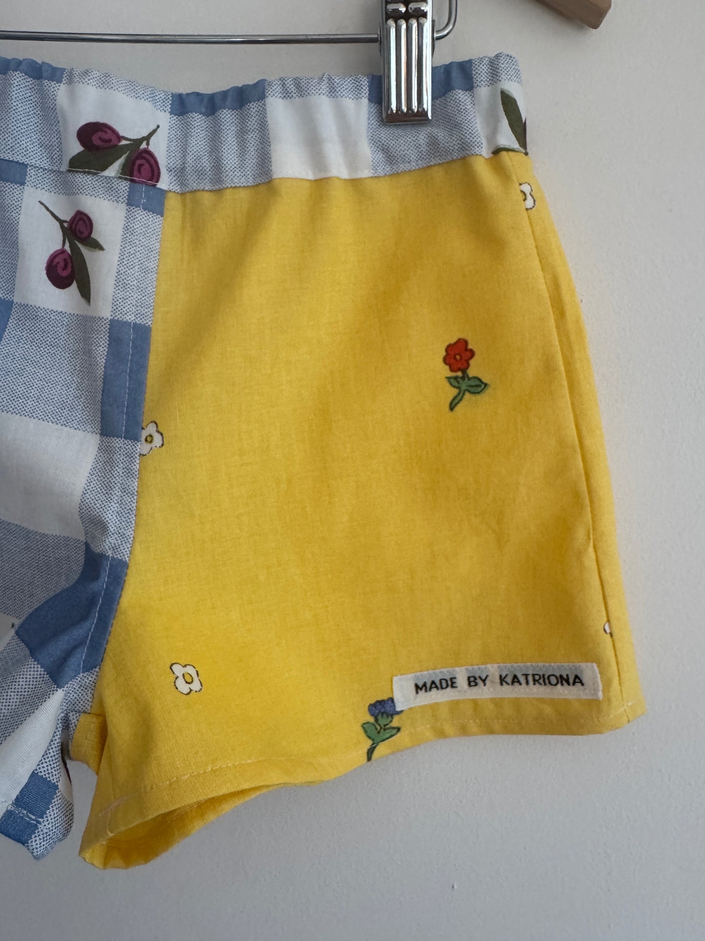 Olive print blue gingham/yellow floral shorts 3-4 years
