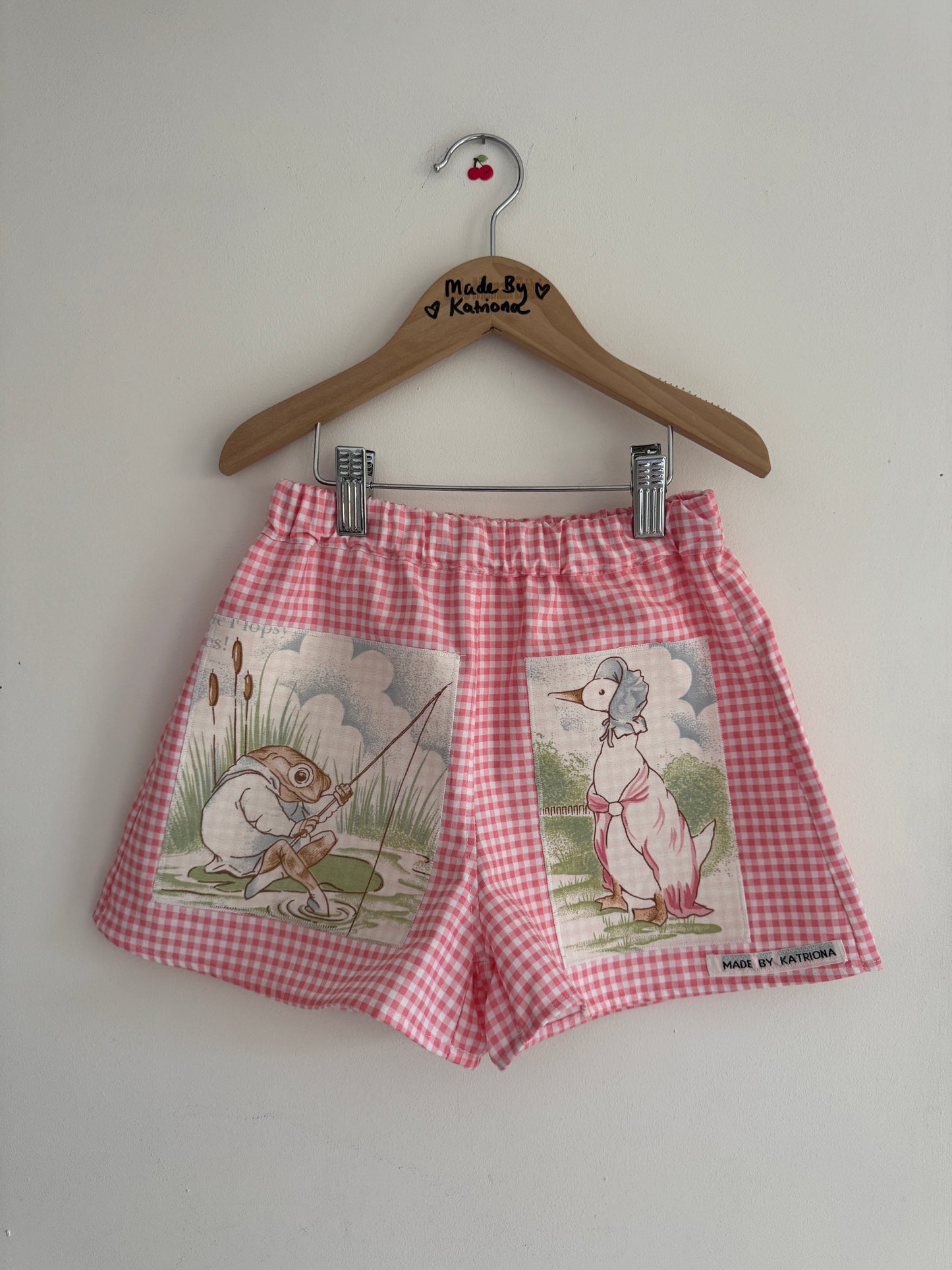 Pink gingham shorts with ‘Peter Rabbit’ patches 4-5 years