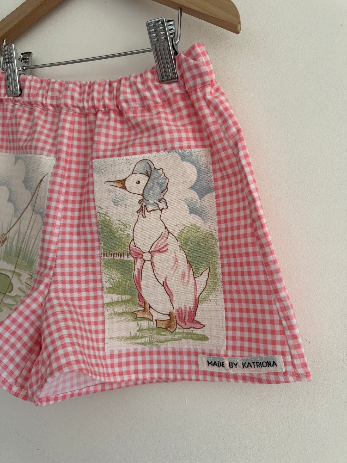 Pink gingham shorts with ‘Peter Rabbit’ patches 4-5 years