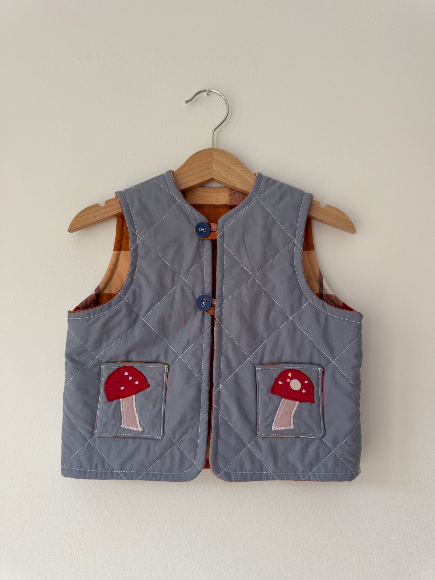 Hedgehog & toadstool reversible quilted gilet 1-2 years