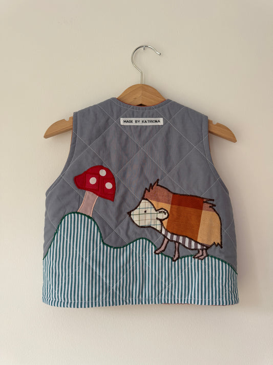 Hedgehog & toadstool reversible quilted gilet 1-2 years