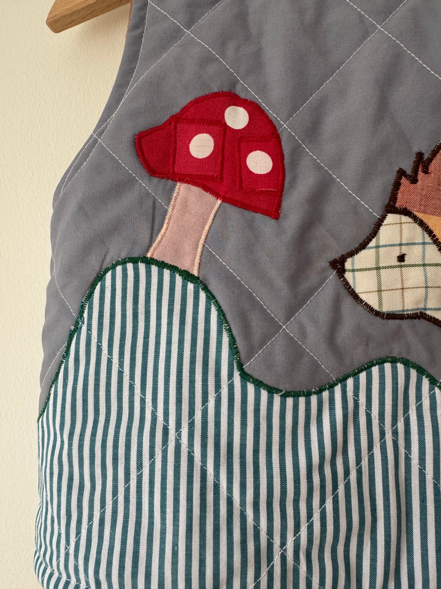Hedgehog & toadstool reversible quilted gilet 1-2 years
