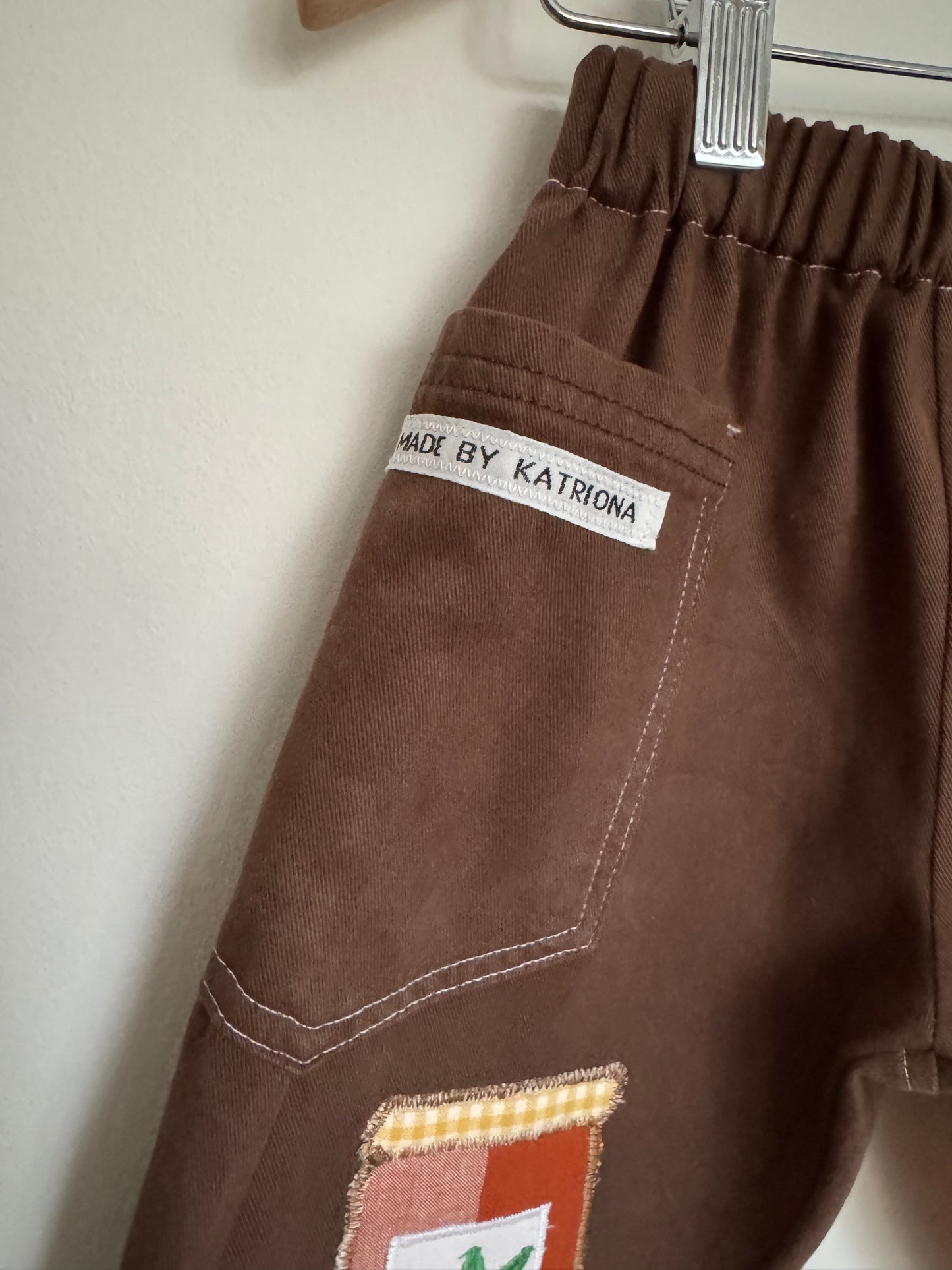 Croissant & marmalade on chocolate denim 12-18 months