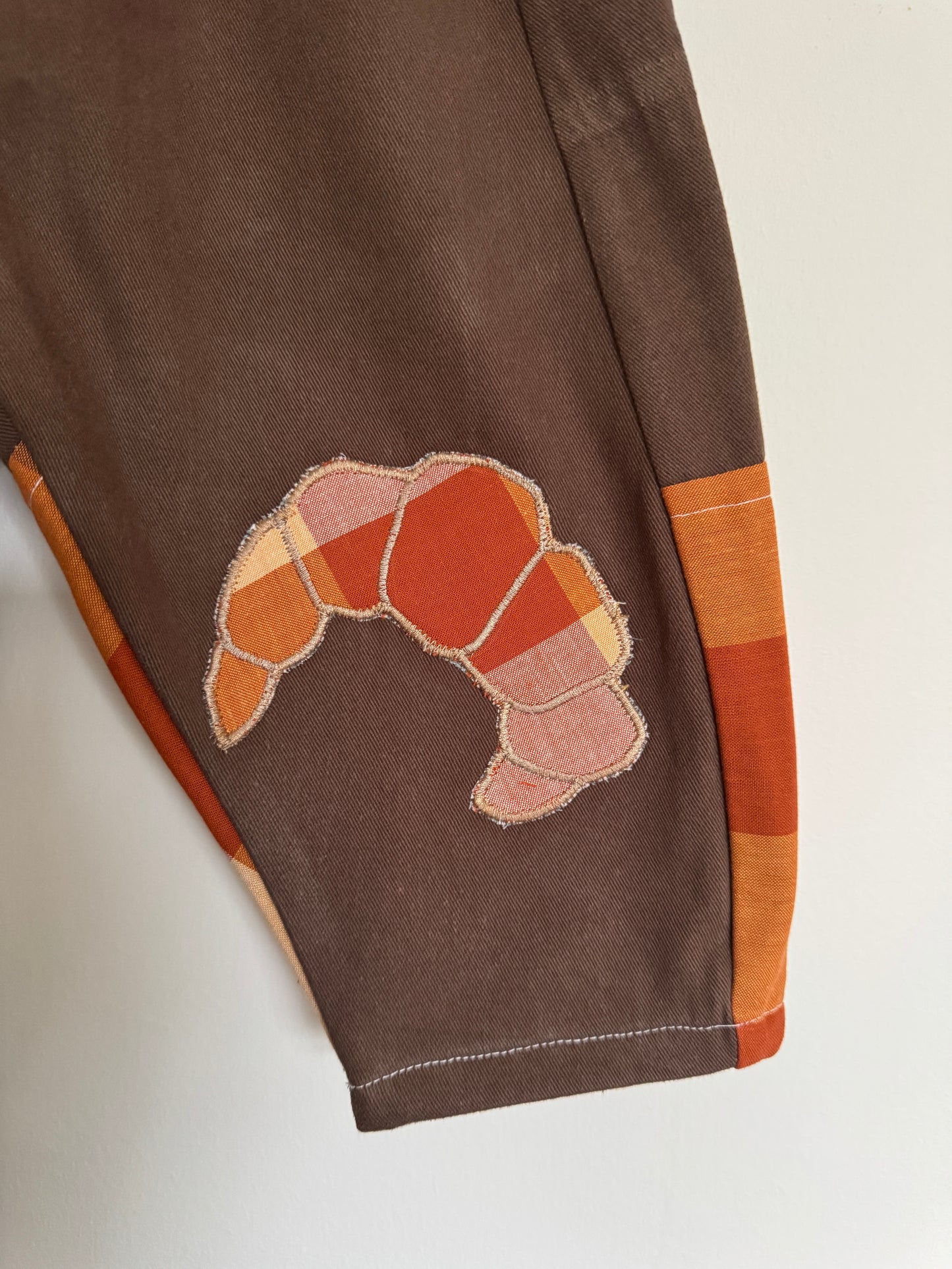 Croissant & marmalade on chocolate denim 12-18 months
