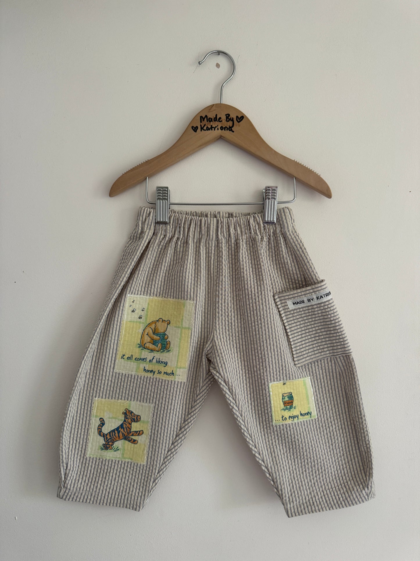 Striped barrel leg pants with Winnie the Pooh patches 18-24 months