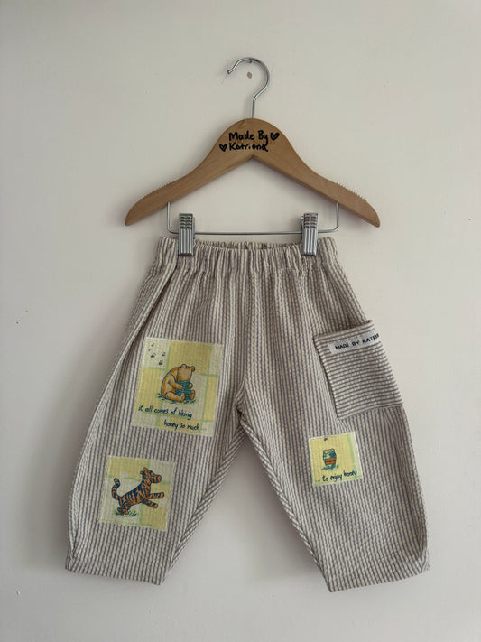 Striped barrel leg pants with Winnie the Pooh patches 3-4 years