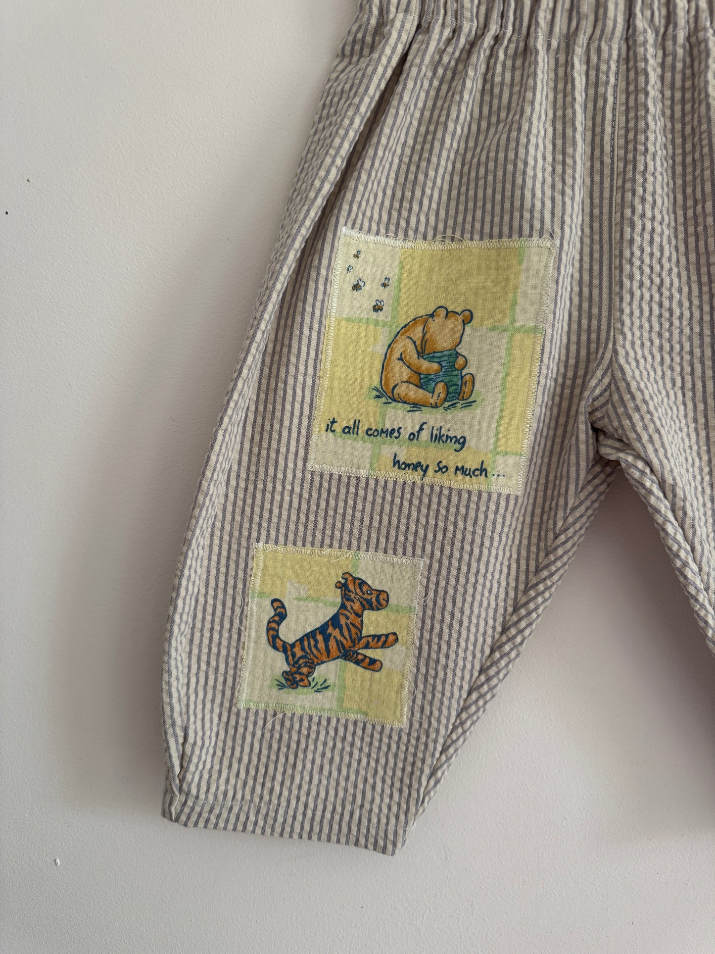 Striped barrel leg pants with Winnie the Pooh patches 18-24 months