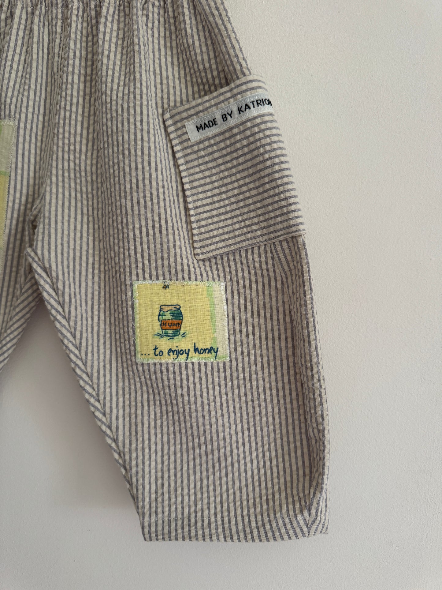 Striped barrel leg pants with Winnie the Pooh patches 18-24 months