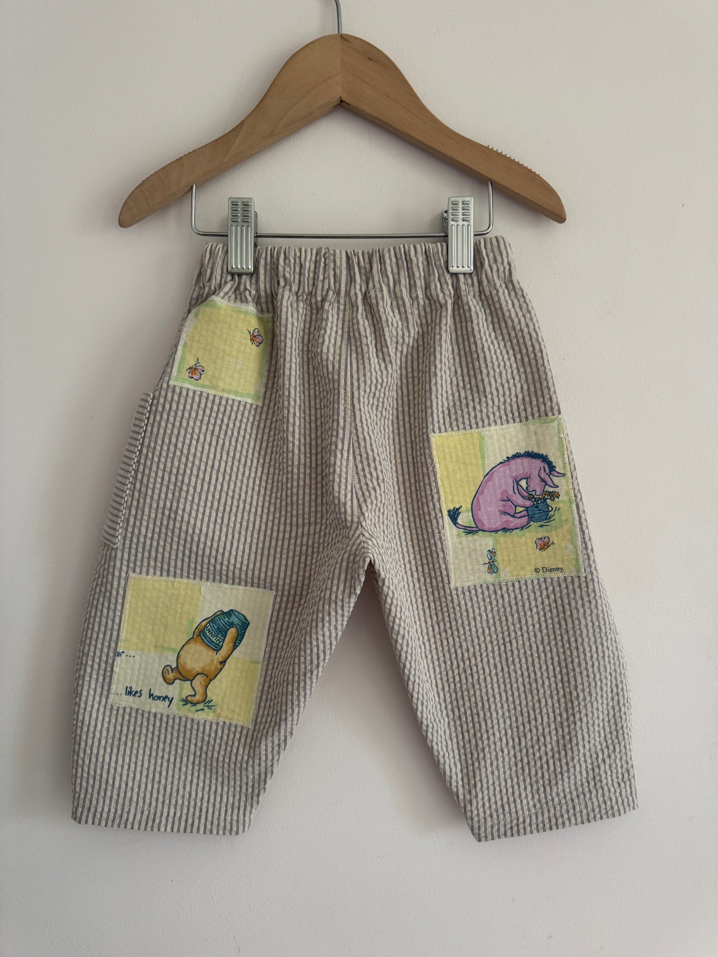 Striped barrel leg pants with Winnie the Pooh patches 18-24 months