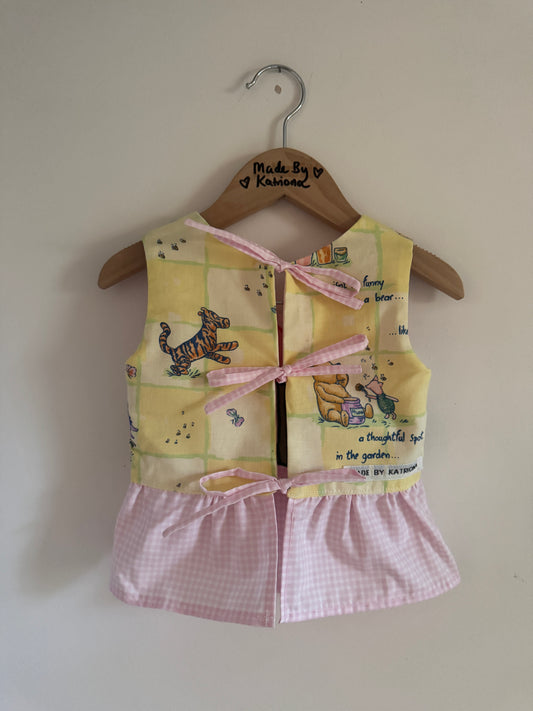 Reversible Winnie the Pooh/tulip appliqué bow top 18-24 months