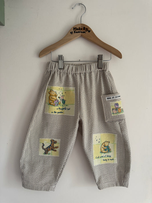 Striped barrel leg pants with Winnie the Pooh patches 2-3 years